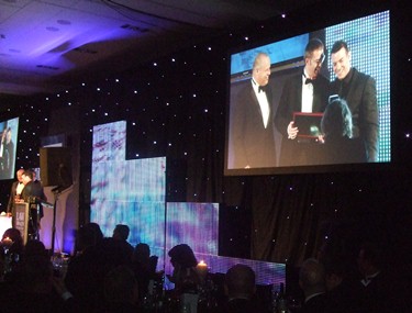 Brian Inkster presented with Chairman's Award on screen - Law Awards of Scotland 2013
